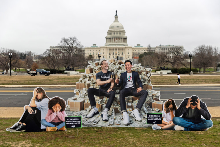 An installation against "Big Tech" depicts Mark Zuckerberg, CEO of Meta, and Shou Zi Chew, CEO of TikTok, outside the Capitol on Jan. 31, 2024. 