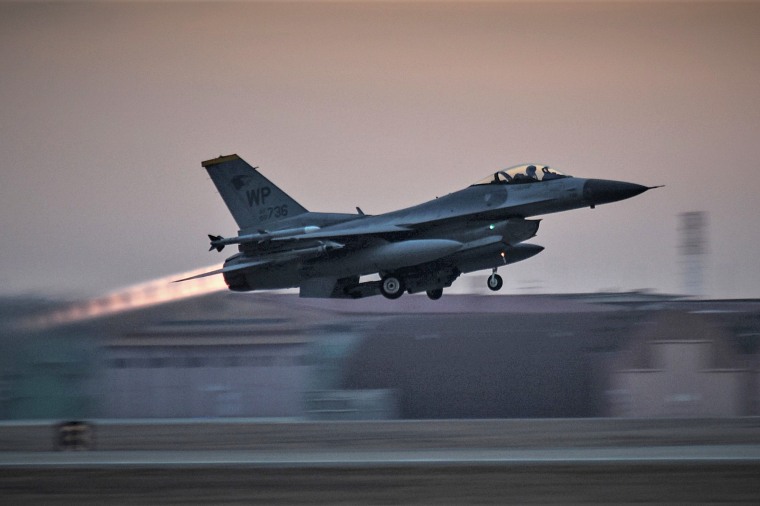 Wolf Pack F-16s take off at dawn