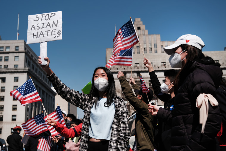 People participate in a protest to demand an end to anti-Asian violence in New York City in 2021.