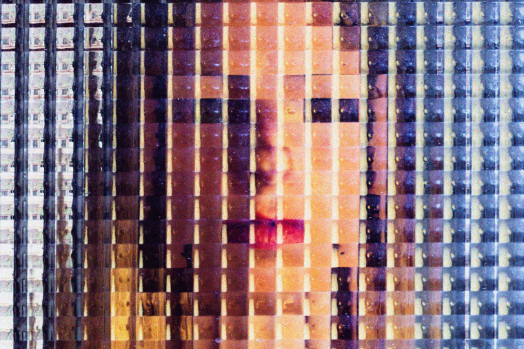 A pixelated, distorted woman.
