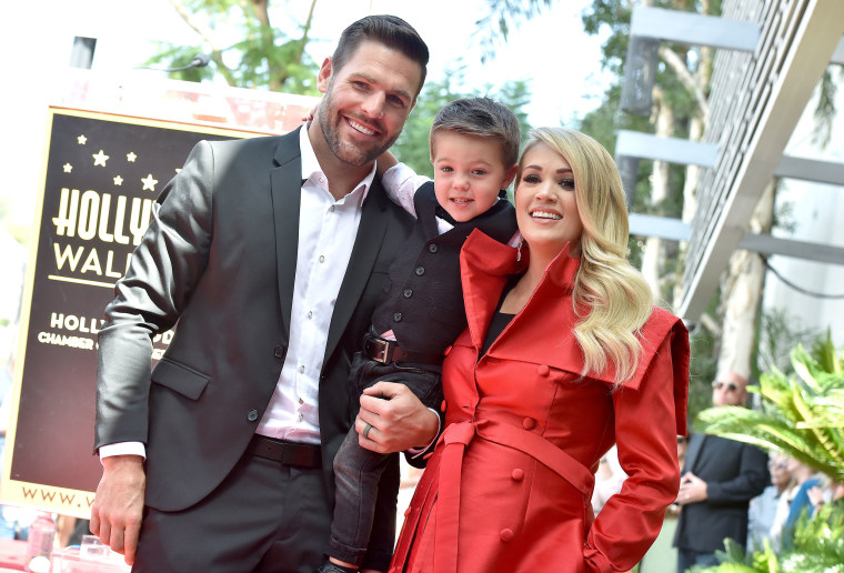 Carrie Underwood, Mike Fisher and Isaiah Michael Fisher attend the ceremony honoring Carrie Underwood with star on the Hollywood Walk of Fame on September 20, 2018 in Hollywood, California. 