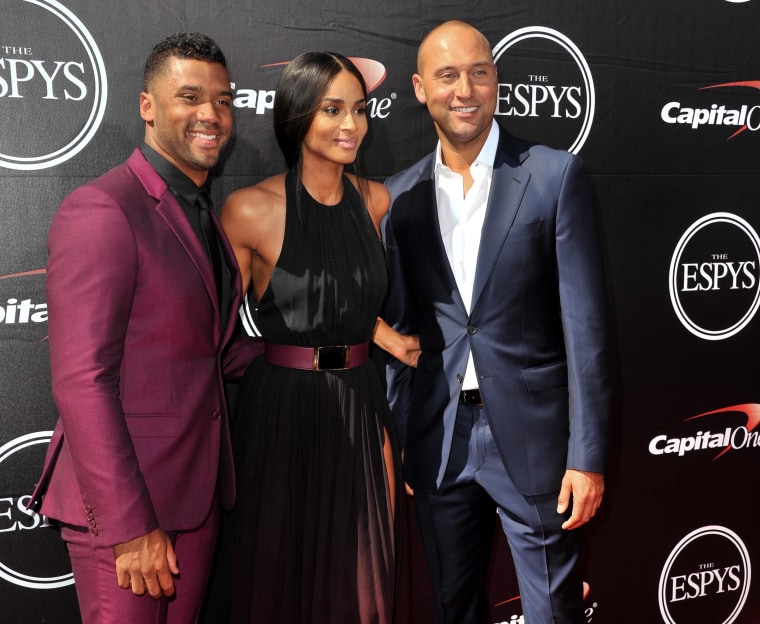 Russell Wilson, recording artist Ciara and New York Yankee Derek Jeter arrive at the 2015 ESPYS at Microsoft Theater on July 15, 2015 in Los Angeles, California. 