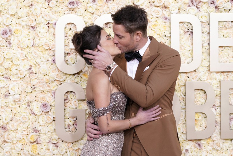 Justin Hartley Kisses Wife Sophia Pernas at Golden Globes Red Carpet