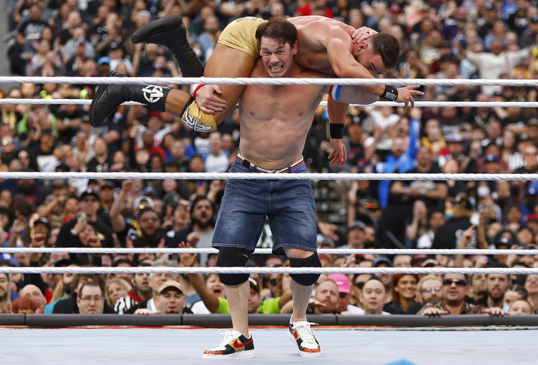 Austin Theory and John Cena at WrestleMania in 2023.