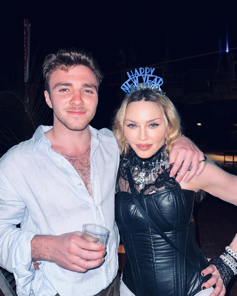 Madonna poses alongside her son Rocco Ritchie for New Year's.