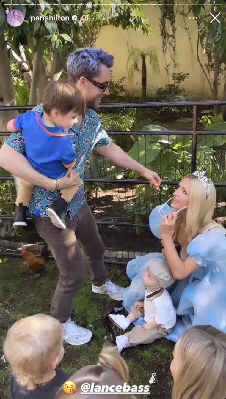 Lance Bass and his twins, Violet and Alexander, met up with Hilton and Phoenix in the petting zoo.