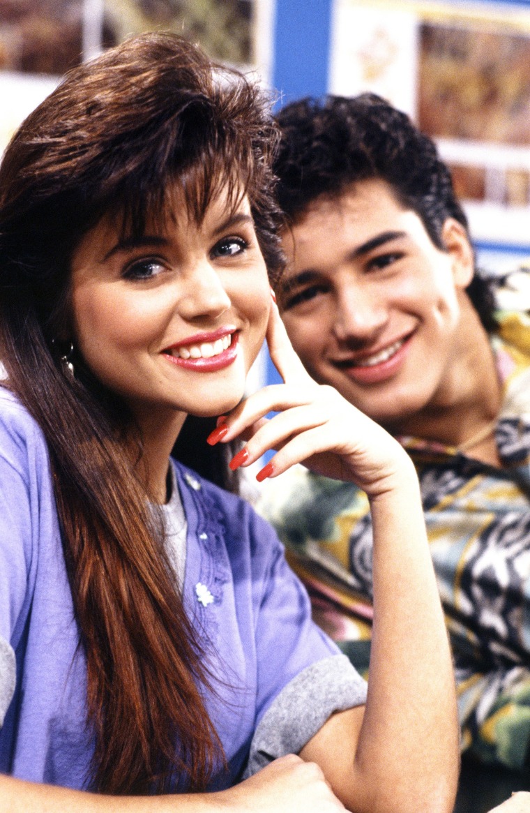 Tiffani Thiessen as Kelly Kapowski and Mario Lopez as A.C. Slater in "Saved by the Bell."