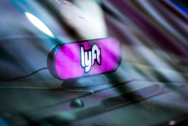 A Lyft Inc. light sits on the dashboard of a vehicle in Times Square on May 8, 2019 in New York.