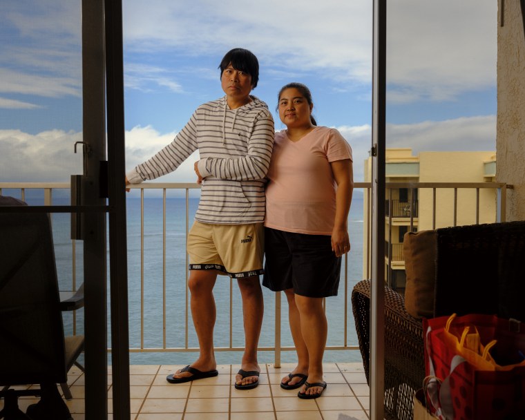 Manny and Claire Ceralde at their hotel room in the Royal Kahana Maui in Ka'anapali. The family has been living in hotel rooms since the Aug. 8 fire destroyed their home. 