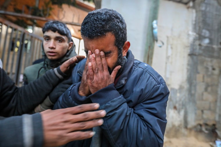 Mourners collect the bodies of friends and relatives in Rafah, Gaza, on Feb. 1, 2024.