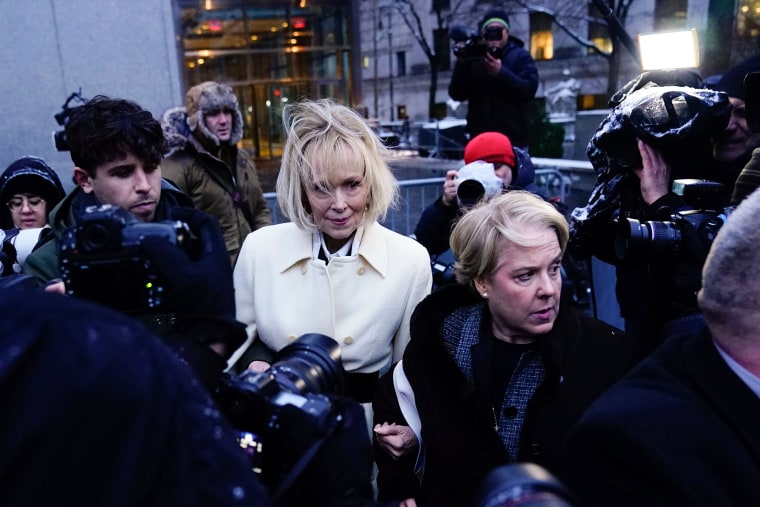 E. Jean Carroll leaves Manhattan federal court with her lawyer Roberta Kaplan.