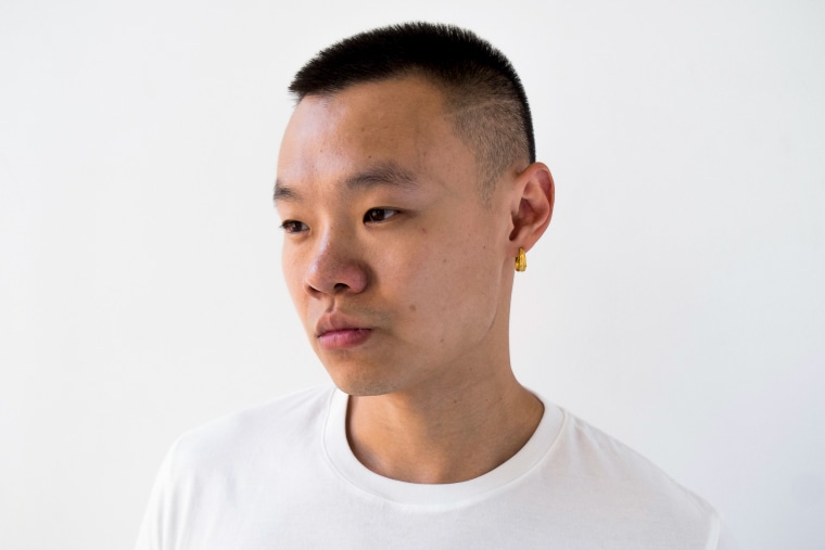 Chinese American rapper Bohan Phoenix poses for a photograph shootout for his album cover.