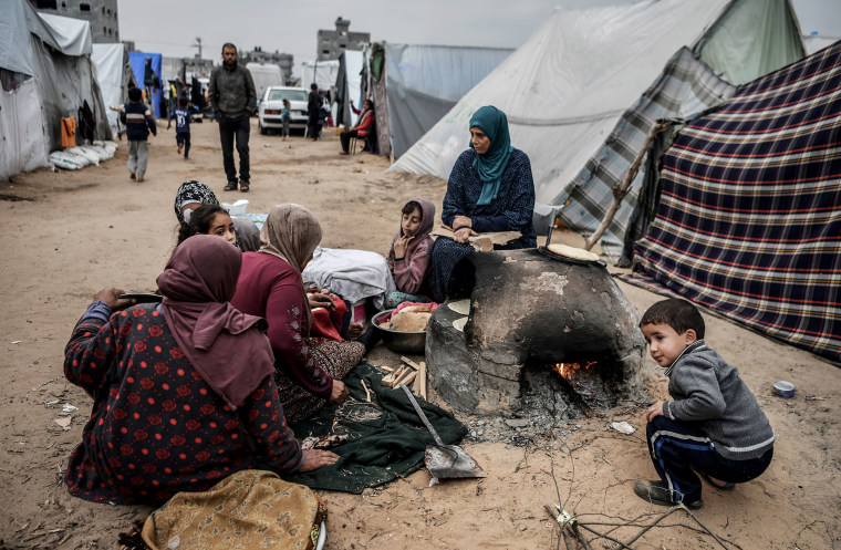 Thousands of Palestinians who fled the Israeli army attacks and took refuge in Rafah city in the southern Gaza Strip are struggling to survive under hard conditions. Some families live in tents due to the density in the city. Displaced Palestinians, who are trying to live in tents despite the cold weather conditions, are short of beds and blankets.