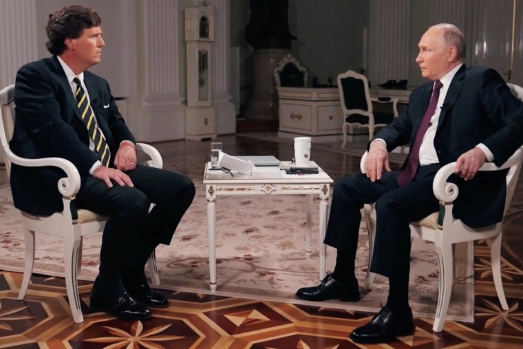 Russian President Vladimir Putin speaks during an interview with U.S. television host Tucker Carlson, in Moscow politics political politician