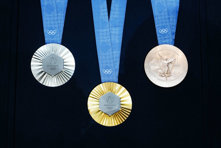 The Paris Olympics medals are monumental: They’re embedded with pieces of the Eiffel Tower
