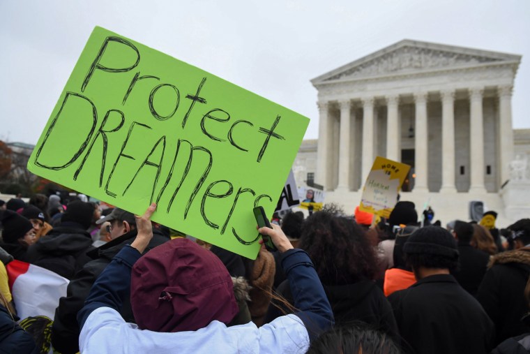 People rally in front of the US Supreme Court on Nov. 12, 2019.