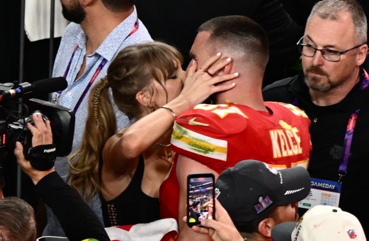 Taylor Swift kisses Kansas City Chiefs' tight end Travis Kelce after the Chiefs won the 2024 Super Bowl in Las Vegas on Feb. 11, 2024. 