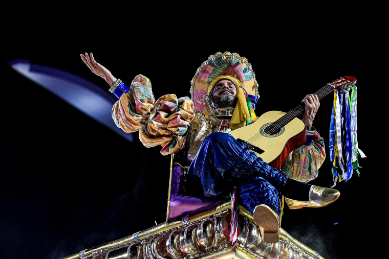 A member of Imperatriz Leopoldinense performs during the Carnival parades at Sapucai Sambodrome in Rio de Janeiro on Feb. 11, 2024.