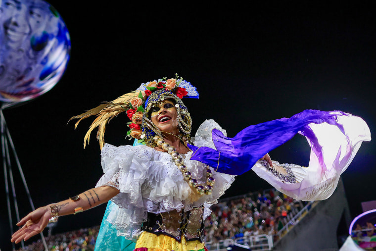 A member of Imperatriz Leopoldinense performs during the Carnival parades at Sapucai Sambodrome in Rio de Janeiro on Feb. 11, 2024.