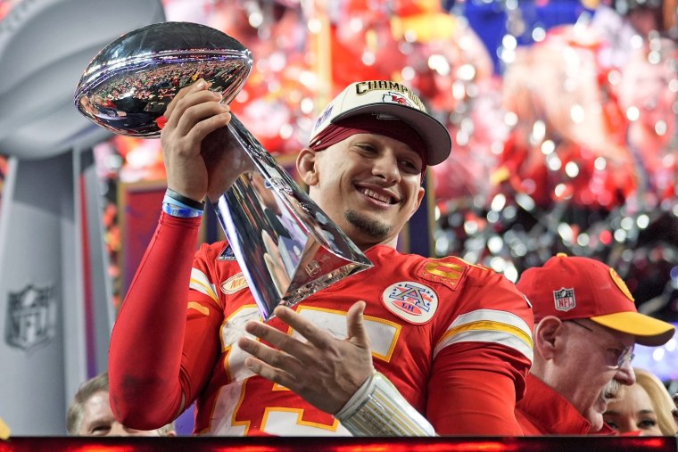 Kansas City Chiefs quarterback Patrick Mahomes celebrates with the trophy after the team's Super Bow win on Feb. 11, 2024, in Las Vegas.