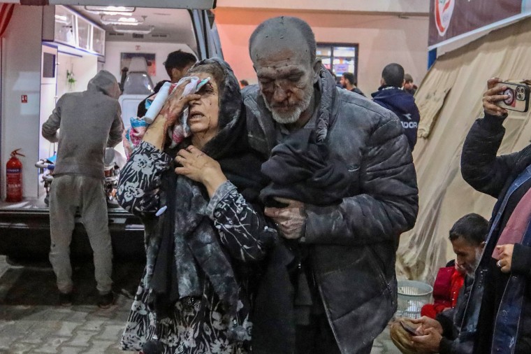 Injured Palestinians arrive at Kuwait Hospital after Israeli strikes on Feb. 12, 2024 in Rafah, Gaza. 
