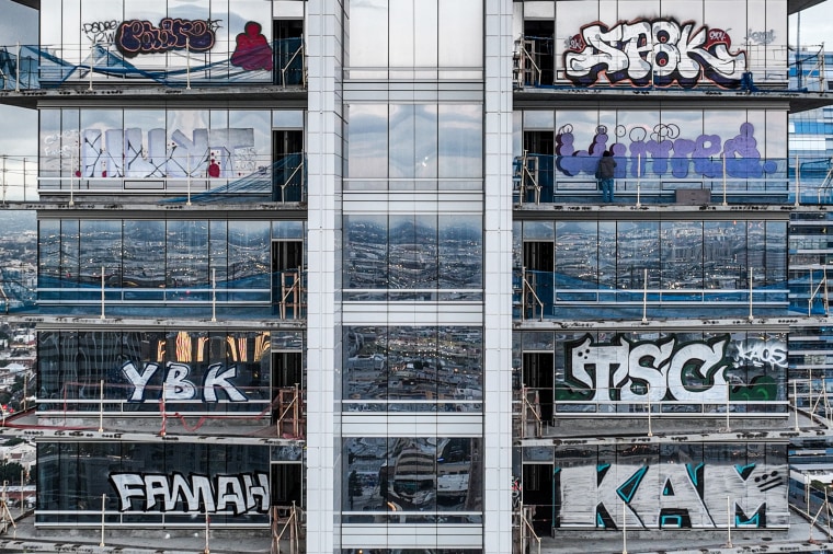 Graffiti slammed Oceanwide Plaza tower.