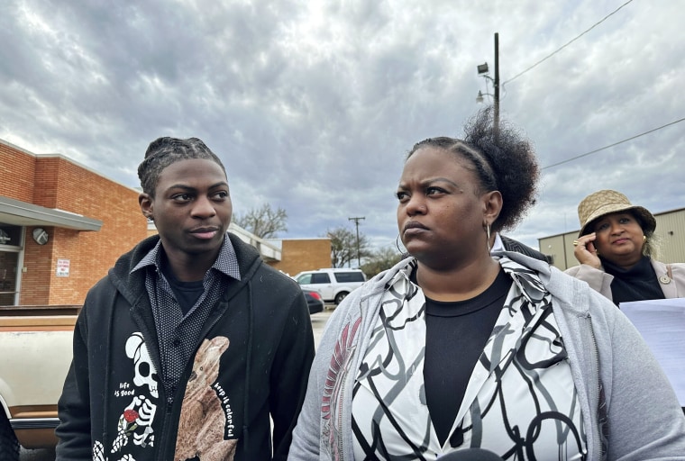 Darryl George and his mother, Darresha George, stand outside a courthouse in Anahuac, Texas, on Wednesday, Jan. 24, 2024.  