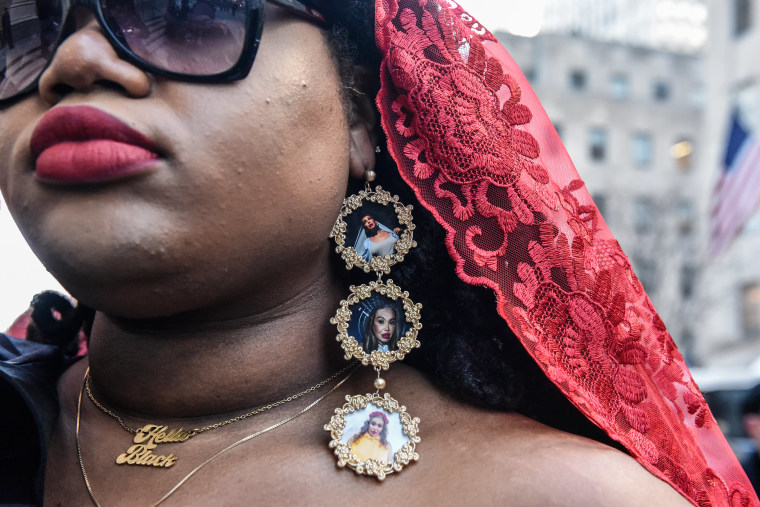 A person wears earrings with images of Cecilia Gentili during her funeral at St. Patrick's Cathedral on Feb. 15, 2024 in New York City.  