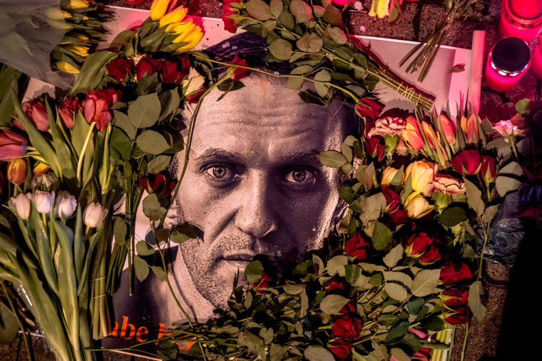 Flowers and a photo of Russian opposition leader Alexei Navalny 