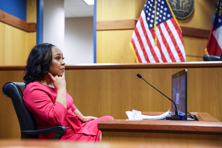 Fulton County District Attorney Fani Willis takes the stand as a witness during a hearing in the case of Georgia v. Donald Trump at the Fulton County Courthouse in Atlanta on Feb. 15.