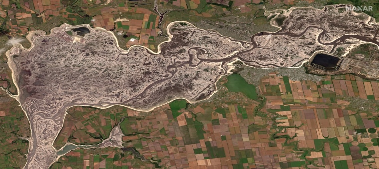 Satellite imagery from last June shows depleted water levels of the Dnieper River by the Zaporizhzhia nuclear power plant, following the destruction of the Khakovka dam. 