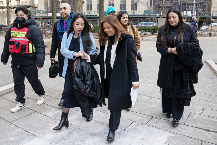 Vilma Kari, front right, smiles, after leaving court in New York City on Feb. 21, 2024.
