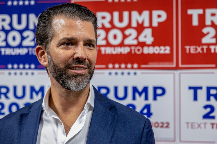 Donald Trump Jr. speaks to media at a rally for his father, Donald Trump, on Feb. 23, 2024 in Charleston, SC.