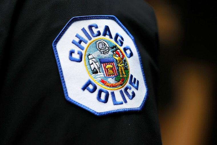 Ex-Chicago police officer is sentenced to a year in prison for forcing ...