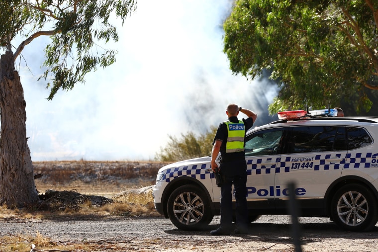 Police are seen during a spot fire outside of Beaufort, Victoria, Wednesday, February 28, 2024. 