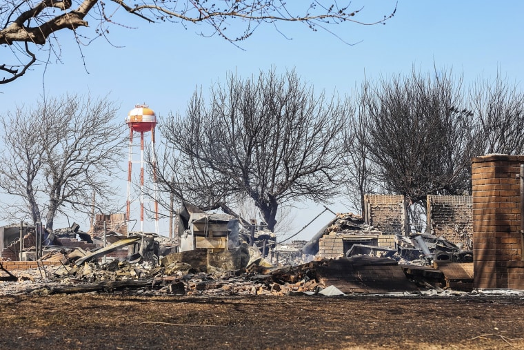 Smoldering remains of a home in Canadian, Texas