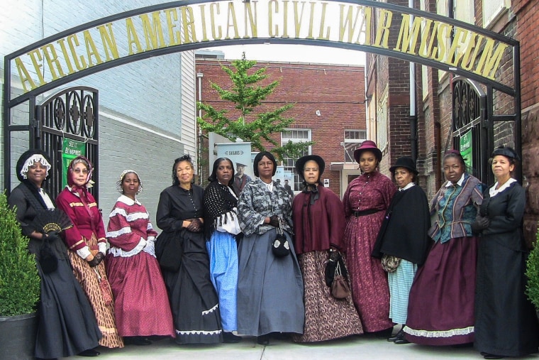 The women reenactors of the American Civil War Museum volunteer auxiliary group called Female RE-Enactors of Distinction (FREED).