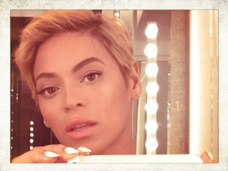 Beyoncé debuts her pixie cut on Instagram in August 2013.