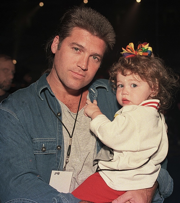 Billy Ray Cyrus and daughter Miley Cyrus in 1994