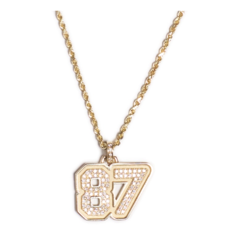 A closer look at Taylor Swift's Super Bowl necklace.