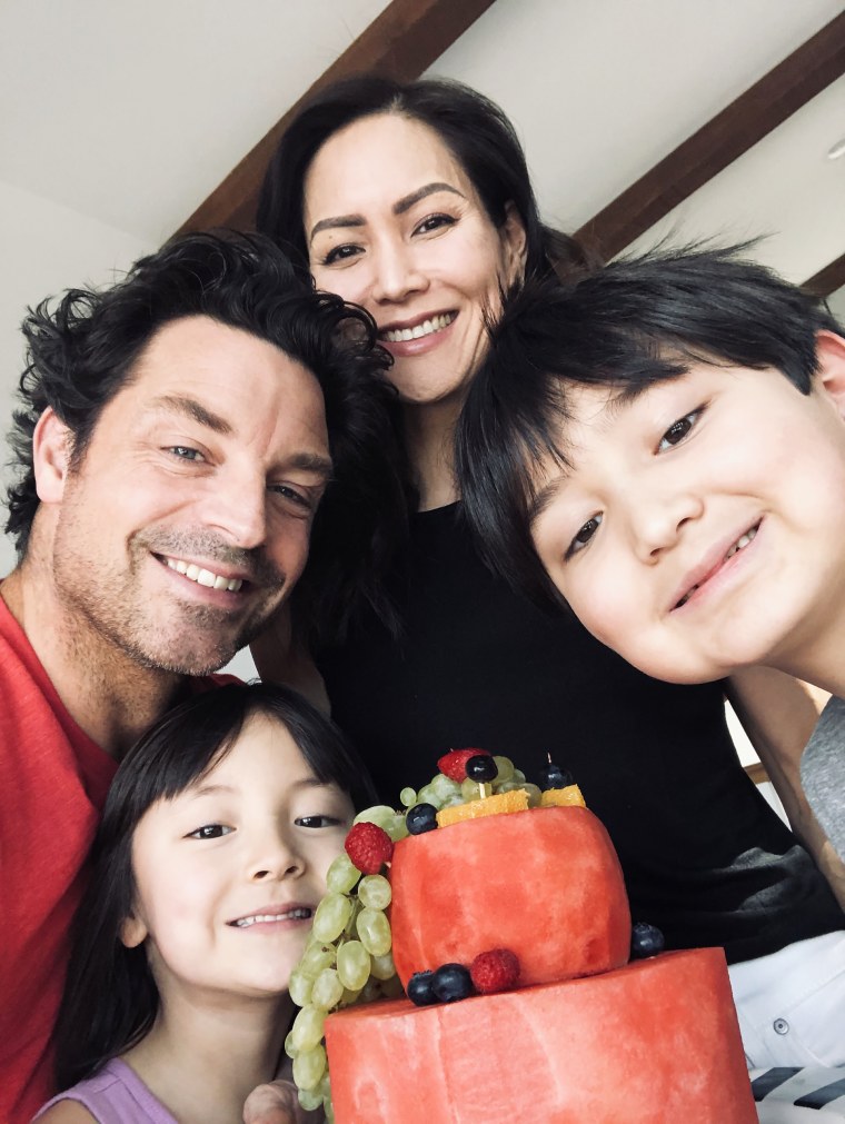 Row shares a happy moment with her husband, Brennan Elliott, and children Liam, right, and Luna.
