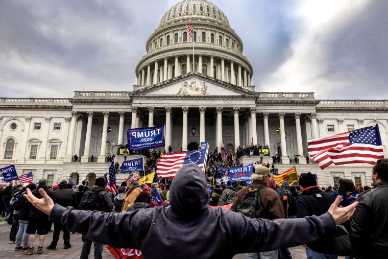 Pro-Trump protesters gather in front of the U.S. Capitol Building on January 6, 2021 in Washington, DC. A pro-Trump mob later stormed the Capitol, breaking windows and clashing with police officers. Five people died as a result.