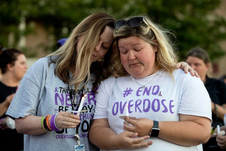 Image: Coordinators with the Tennessee Department of Mental Health and Substance Abuse Services at an International Overdose Awareness Day vigil in Jackson, Tenn., in 2022.