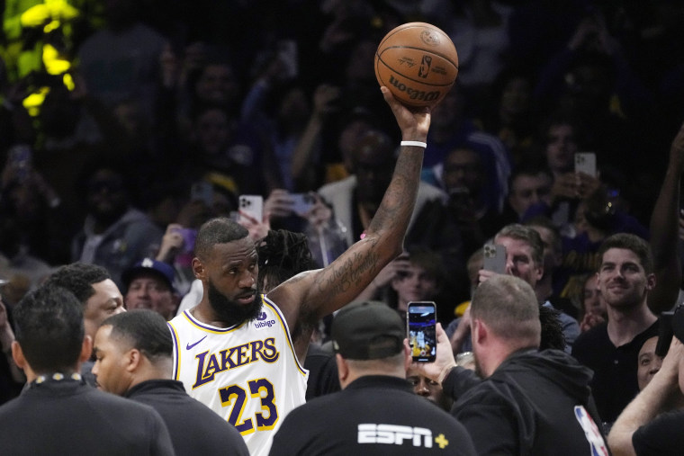 Los Angeles Lakers forward LeBron James acknowledges fans after scoring to become the first NBA player to reach 40,000 points in a career during the first half of an NBA basketball game Saturday, March 2, 2024, in Los Angeles.