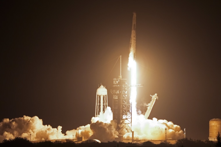 A SpaceX Falcon 9 rocket and Dragon capsule with a crew of four on a mission to the International Space Station lifts off from pad 39A at the Kennedy Space Center in Cape Canaveral, Florida, on Sunday.
