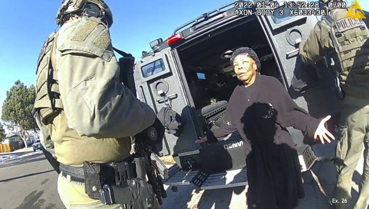 Ruby Johnson surrounded by SWAT officers in Denver