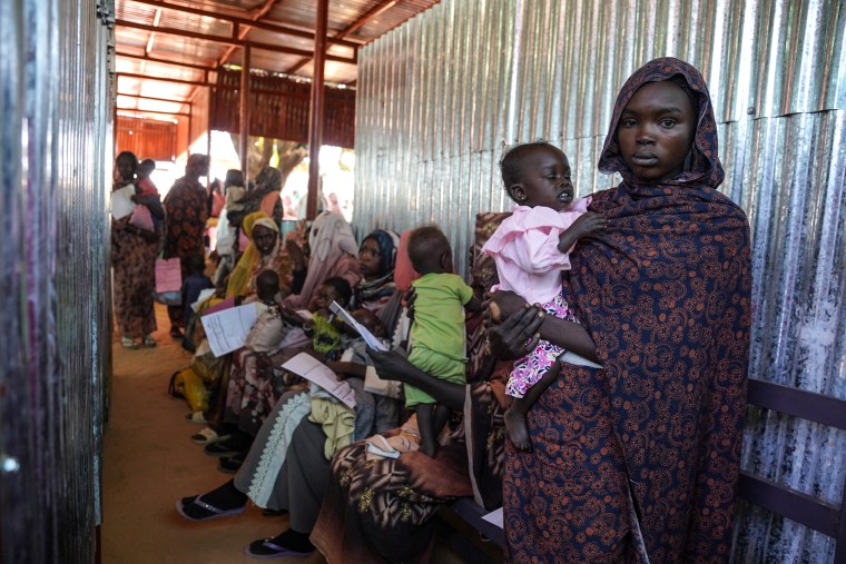 A woman and baby at the Zamzam displacement camp in North Darfur