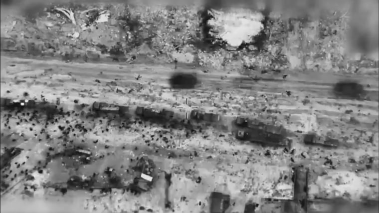 IDF video released Feb. 29 shows bodies lying on the ground between what appear to be aid trucks and IDF tanks.