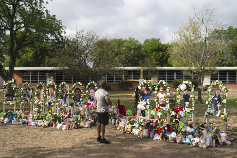 Brian Hackett visits a memorial at Robb Elementary School in Uvalde, Texas