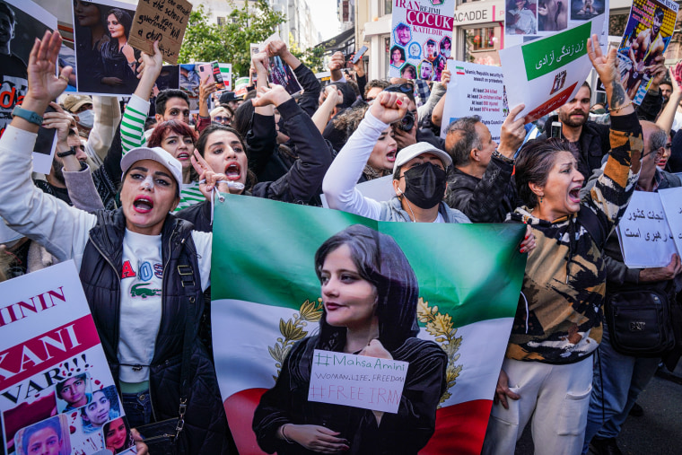 Demonstrators gather to protest over the death of Iranian Mahsa Amini